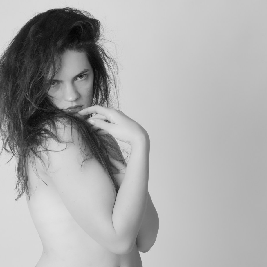 Glamour, black and white, no makeup, cork, topless, implied