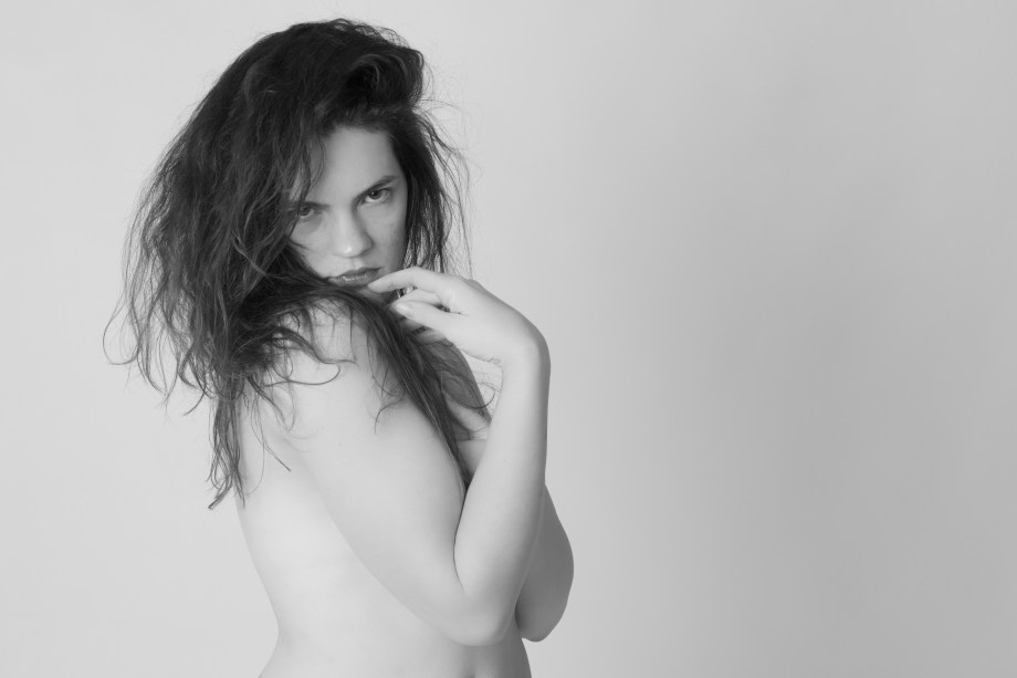 Glamour, black and white, no makeup, cork, topless, implied