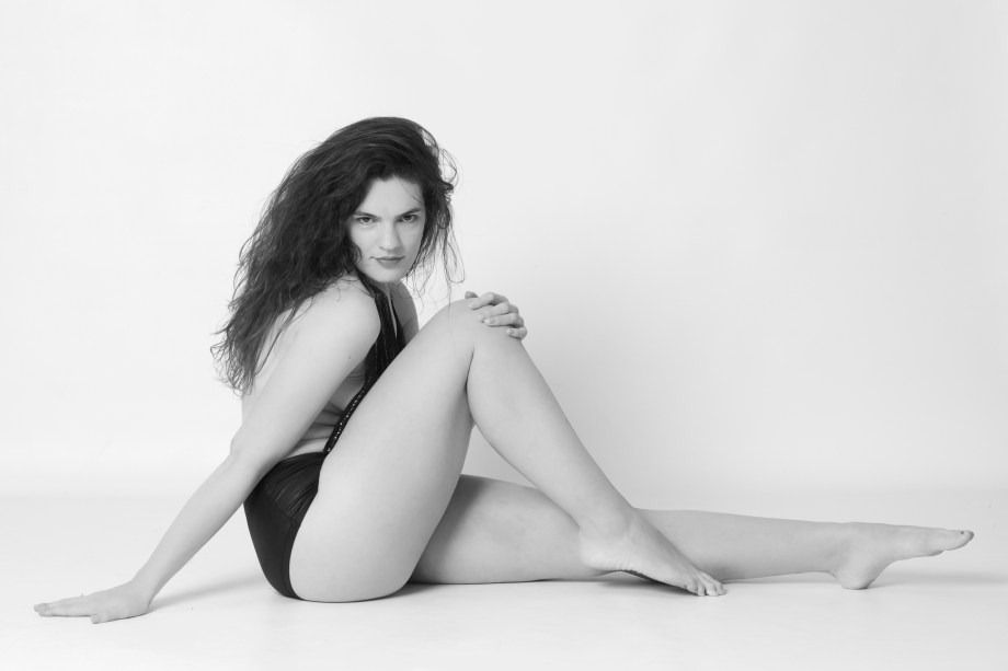 Glamour, black and white, no makeup, cork, topless, implied